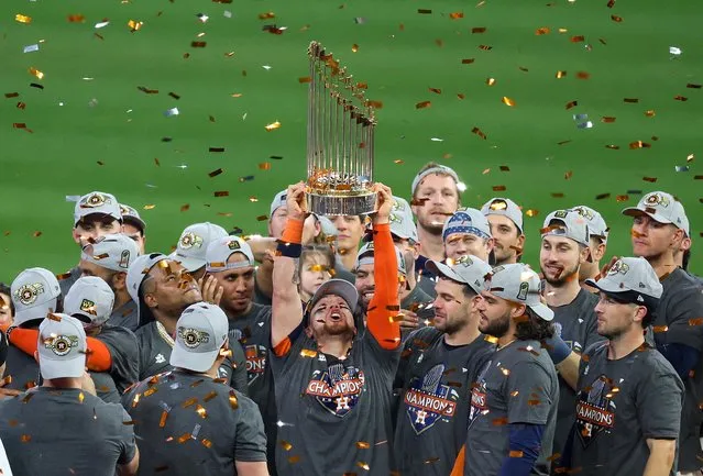The Houston Astros hoist the World Series trophy after defeating the Philadelphia Phillies in game six of the 2022 World Series in Houston, Texas on November 5, 2022. (Photo by Thomas Shea/USA TODAY Sports)
