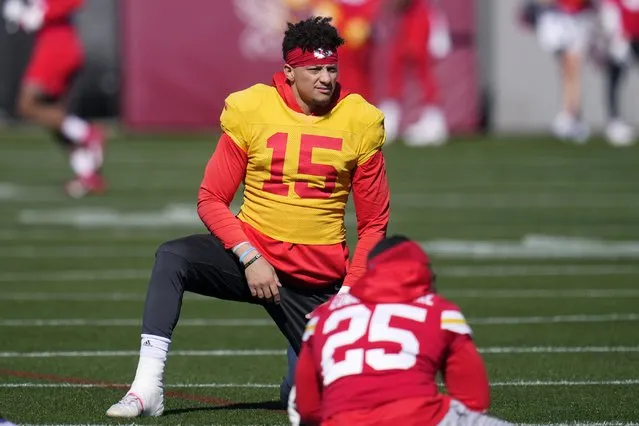 Kansas City Chiefs quarterback Patrick Mahomes (15) stretches with teammates, including running back Clyde Edwards-Helaire (25), during an NFL football practice in Tempe, Ariz., Wednesday, February 8, 2023. The Chiefs will play against the Philadelphia Eagles in Super Bowl 57 on Sunday. (Photo by Ross D. Franklin/AP Photo)