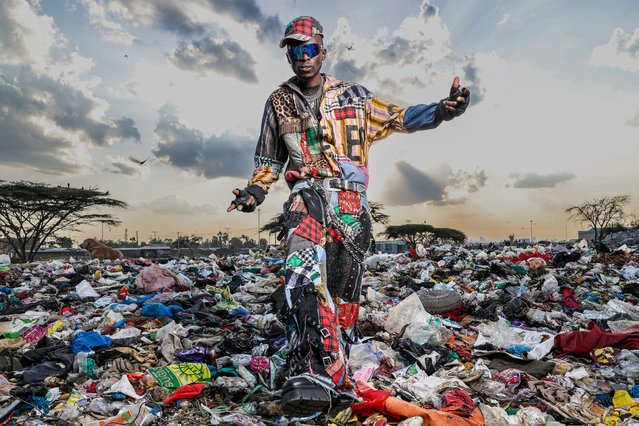 Kenyan designer Morgan Azedy poses for a photograph with one of his creations at a dumpsite where he collects textile waste in the Embakasi neighborhood of Nairobi, Kenya, 18 September 2025. Morgan Azedy, a Kenyan urban fashion designer behind the brand “Kenyan Raw”, uses upcycled and recycled materials, including fabric waste and discarded clothes from landfills and markets, to create contemporary designs. His work promotes waste reduction and sustainable practices within the fashion industry. (Photo by Daniel Irungu/EPA)