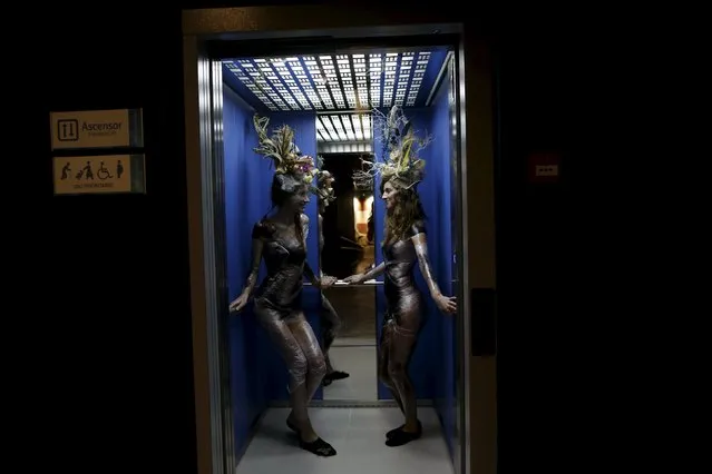 Models wearing creations by Luis Benitez are seen in an elevator during an urban shoot as part of Andalucia de Moda (Andalusia Fashion) at the aquarium of Seville, southern Spain, November 11, 2015. (Photo by Marcelo del Pozo/Reuters)