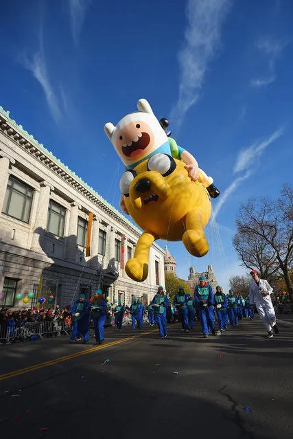 The Jake and Finn from "Adventure Time with Finn and Jake" balloon floats through the parade route during the 89th Annual Macy's Thanksgiving Day Parade on November 26, 2015 in New York City. (Photo by Michael Loccisano/Getty Images)