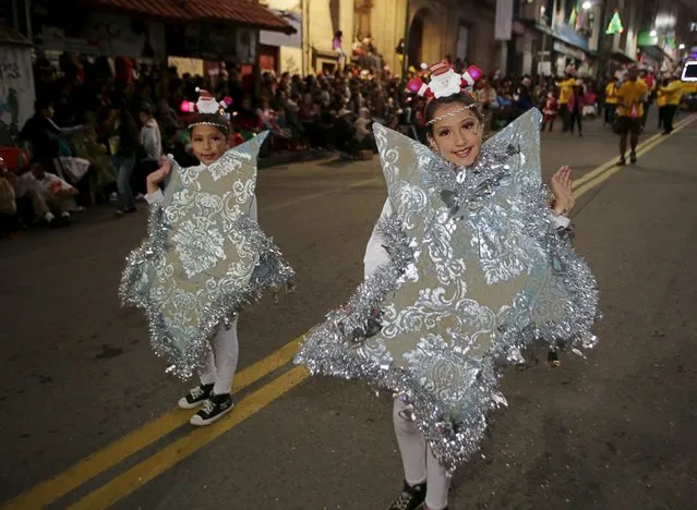 Young revelers participate in a Christmas parade in La Paz, Bolivia, December 12, 2015. (Photo by David Mercado/Reuters)