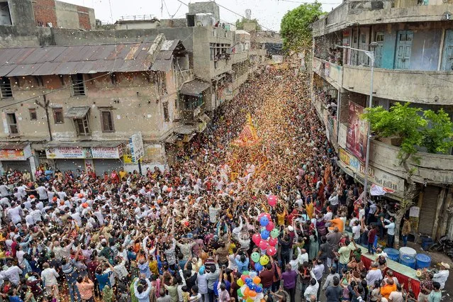 Hindu devotees take part in the annual Ratha Yatra (religious procession) of Lord Jagannath in Ahmedabad on June 20, 2023. (Photo by Sam Panthaky/AFP Photo)