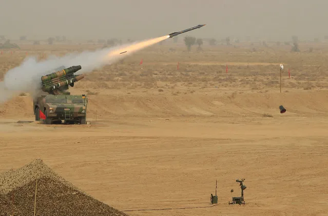 A rocket is fired during military exercises in Bahawalpure, Pakistan, November 16, 2016. (Photo by Reuters/Stringer)