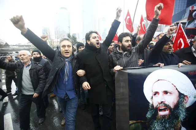 Shi'ite protesters carry posters of Sheikh Nimr al-Nimr during a demonstration in front of Saudi Arabia's Consulate in Istanbul, Turkey, January 3, 2016. (Photo by Osman Orsal/Reuters)