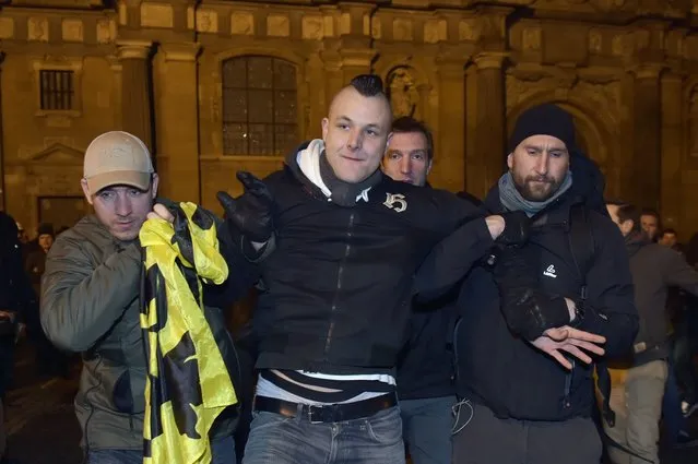 A member of the Belgian branch of Germany's anti-Islam group, PEGIDA (Patriotic Europeans Against the Islamisation of the West), is detained by the police as he takes part in a demonstration in Antwerp, March 2, 2015. Germany has experienced an upsurge of anti-Islam sentiment in the form of weekly PEGIDA protests in Dresden.  REUTERS/Eric Vidal