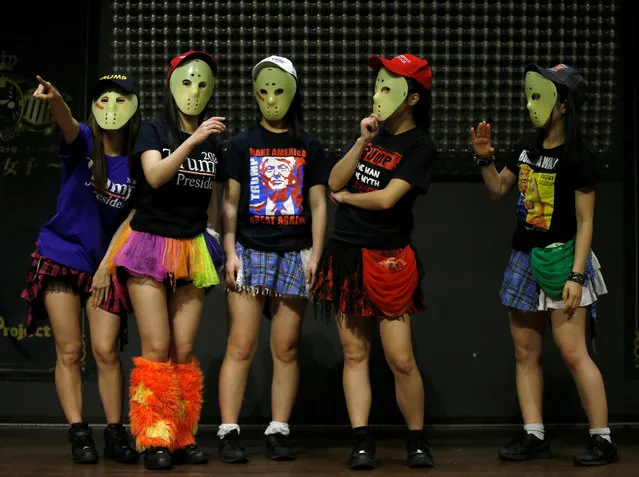 Members of Japanese idol group Kamen Joshi (Masked Girls) in attires featuring images or names of U.S. President-elect Donald Trump, attend a rehearsal for a concert at their theatre in Tokyo's Akihabara district, Japan, December 12, 2016. (Photo by Toru Hanai/Reuters)