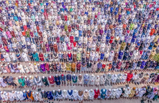 Aerial view shows People attending a Muslim Funeral of a person who lost the battle against Covid-19 disease in Barishal, Bangladesh on October 3, 2023. (Photo by Mustasinur Rahman Alvi/Alamy Live News)
