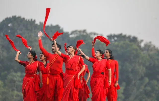 Members of the Bangladesh cultural organization “Chhayanaut” perform at the Dhaka University playground during the 53nd Victory Day celebration in Dhaka, Bangladesh, 16 December 2023. On 16 December 1971, Bangladesh became an independent country, under the leadership of Sheikh Mujibur Rahman, after a victory in the War of Liberation against Pakistani occupation forces. (Photo by Monirul Alam/EPA)