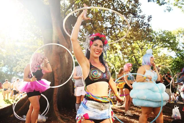 Parade goers prepare for the start of the 2016 Sydney Gay & Lesbian Mardi Gras Parade on March 5, 2016 in Sydney, Australia. The Sydney Mardi Gras parade began in 1978 as a march and commemoration of the 1969 Stonewall Riots of New York. It is an annual event promoting awareness of gay, lesbian, bisexual and transgender issues and themes. (Photo by Brendon Thorne/Getty Images)