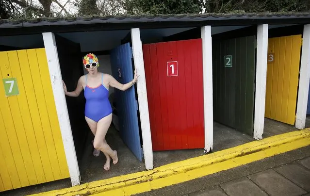 A woman leaves her changing room as she participates in the Cold Water Swimming Championship at Tooting Bec Lido in south London, Britain January 28, 2017. (Photo by Neil Hall/Reuters)