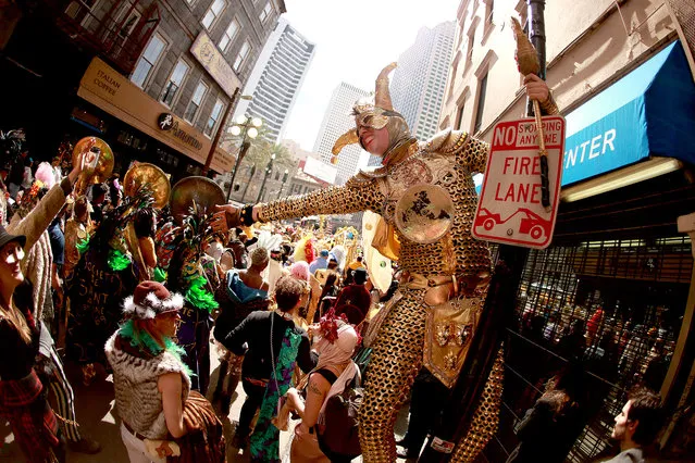 Members of the Krewe Of Saint Anne march down Royal Street Mardi Gras Day on March 05, 2019 in New Orleans, Louisiana. Mardi Gras, also called Shrove Tuesday, Carnival Tuesday or Pancake Tuesday, is associated with Carnival celebrations in New Orleans, Rio de Janeiro and around the world. (Photo by Sean Gardner/Getty Images)