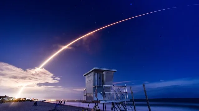 Cocoa Beach in Florida was a great place to watch a SpaceX Falcon 9 rocket carrying Starlink satellites from the Kennedy Space Center at 11pm on Saturday, March 23, 2024. (Photo by Malcolm Denenmark/Florida Today via AP Photo)