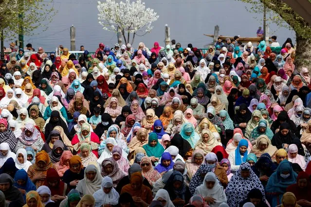 Kashmiri women pray as they attend the last Friday prayers during the Muslim holy fasting month of Ramadan, at Hazratbal shrine in Srinagar on April 5, 2024. (Photo by Sharafat Ali/Reuters)