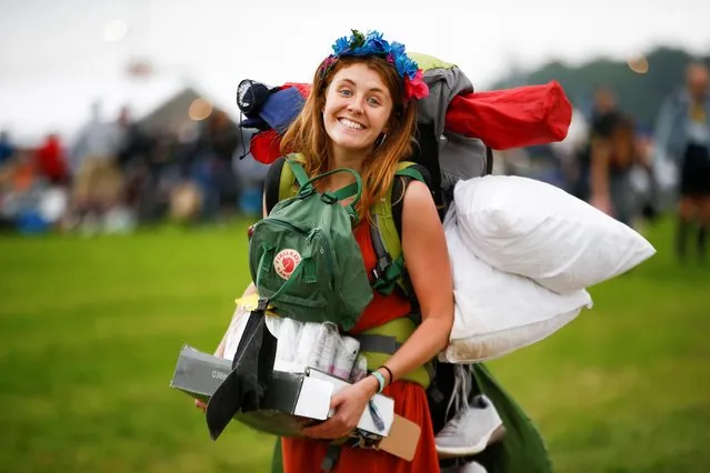 A reveller arrives for Glastonbury Festival at Worthy farm in Somerset, Britain on June 26, 2019. (Photo by Henry Nicholls/Reuters)