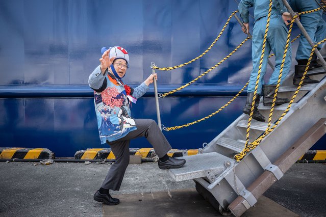 Hideki Tokoro, president of whaling company Kyodo Senpaku, boards Japan's new whaling mothership, the Kangei Maru, following the ship's launch ceremony at a port in Shimonoseki city, Yamaguchi prefecture on May 21, 2024. The nearly 9,300-tonne ship set sail on its maiden hunting voyage on May 21, heralding a new era for the controversial practice defended by the government as an integral part of national culture. (Photo by Yuichi Yamazaki/AFP Photo)