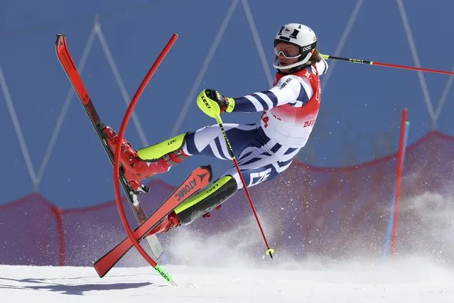 Jan Zabystran, of Czech Republic crashes out during the first run of the men's slalom at the 2022 Winter Olympics, Wednesday, February 16, 2022, in the Yanqing district of Beijing. (Photo by Alessandro Trovati/AP Photo)