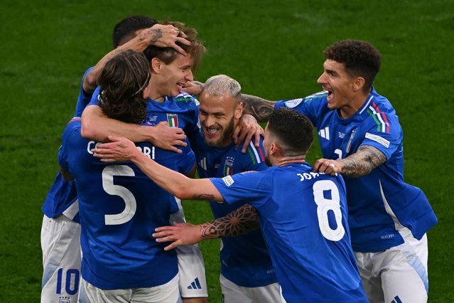 Italy's midfielder #18 Nicolo Barella (2nd-L) celebrates with teammates after scoring his team's second goal during the UEFA Euro 2024 Group B football match between Italy and Albania at the BVB Stadion in Dortmund on June 15, 2024. (Photo by Ozan Kose/AFP Photo)