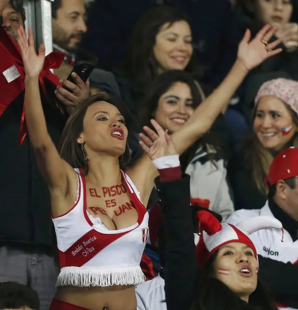 Peru fans cheer ahead of the team's Copa America 2015 third-place soccer match against Paraguay at Estadio Municipal Alcaldesa Ester Roa Rebolledo in Concepcion, Chile, July 3, 2015. (Photo by Mariana Bazo/Reuters)