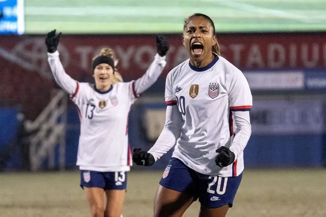 U.S. forward Catarina Macario (20) and midfielder Ashley Sanchez (13) celebrate Macario's goal during the first half against Iceland in a SheBelieves Cup soccer match Wednesday, February 23, 2022 in Frisco, Texas. (Photo by Jeffrey McWhorter/AP Photo)