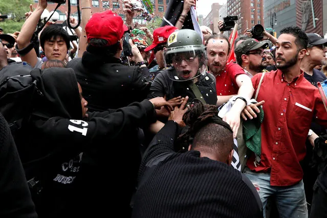 Demonstrators clash with people opposing their rally during a May Day protest in Union Square in New York City on May 2, 2017. (Photo by Mike Segar/Reuters)