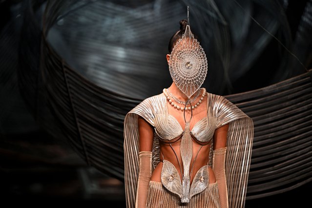 A model presents a creation by Indian designer Amit Aggarwal during the FDCI India Couture Week in New Delhi on July 28, 2024. (Photo by Sajjad Hussain/AFP Photo)