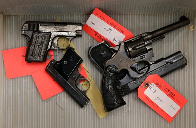 Handguns turned in from the public as part of the “Gun Turn-in” event where a gift card is given for every firearm turned over to Chicago Police are seen in a box at Universal Missionary Baptist Church in Chicago, Illinois, U.S. May 28, 2016. (Photo by Jim Young/Reuters)