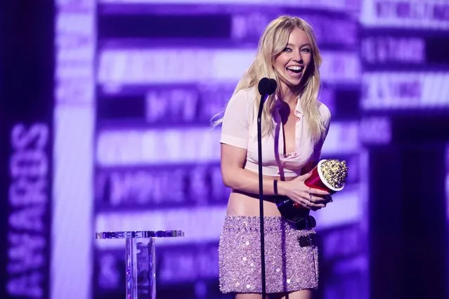 American actress Sydney Sweeney reacts after winning the Best Fight Award at the MTV Movie & TV Awards at Barker Hangar in Santa Monica, California, U.S., June 5, 2022. (Photo by Mario Anzuoni/Reuters)