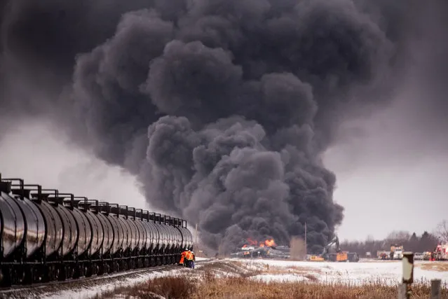 Thick smoke billows from a derailed Canadian Pacific Freight train near Guernsey, Saskatchewan, Canada on February 6, 2020. (Photo by Canadian Press/Rex Features/Shutterstock)