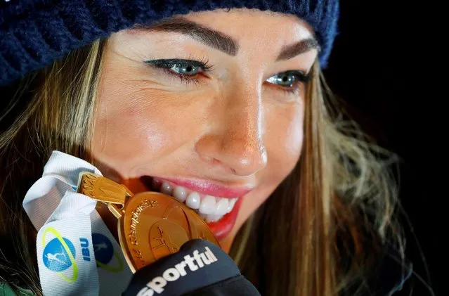 Gold medalist Italy's Dorothea Wierer poses with her medal after the ceremony after the women's 10k pursuit at the Biathlon World Championships in Antholz-Anterselva, Italy, February 16, 2020. (Photo by Leonhard Foeger/Reuters)