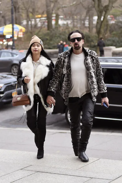 Nicolas Cage and his girlfriend Riko Shibata matching black leather pants while going insid The American Museum of Natural History in New York on March 2, 2020. (Photo by Elder Ordonez/Splash News and Pictures)