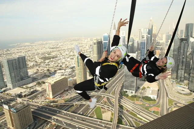 Sky Views Dubai, the emirate's newest attraction for thrill-seekers on December 15, 2021. Visitors can walk around an glass-floored observation desk, speed down a clear glass slide or don a harness and brave a 53rd-floor outdoor viewing platform. (Photo by Sky Views Dubai)