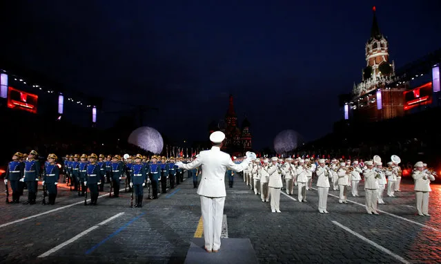 Members of Russian President's Band and the Guard of Honor of the Presidential regiment perform during the International Military Orchestra Music Festival “Spasskaya Tower” media preview in Red Square in Moscow, Russia, August 26, 2016. (Photo by Sergei Karpukhin/Reuters)