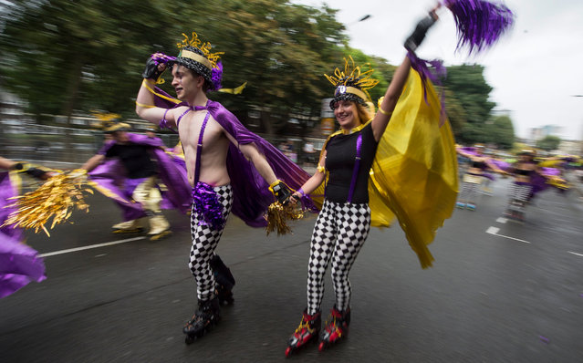 Revellers take part in the Children's Day parade of the Notting Hill Carnival in London, Britain, 28 August 2016. The street festival celebrates this year its 52nd anniversary and more than a million people are expected to attend on 28 and 29 August. (Photo by Will Oliver/EPA)