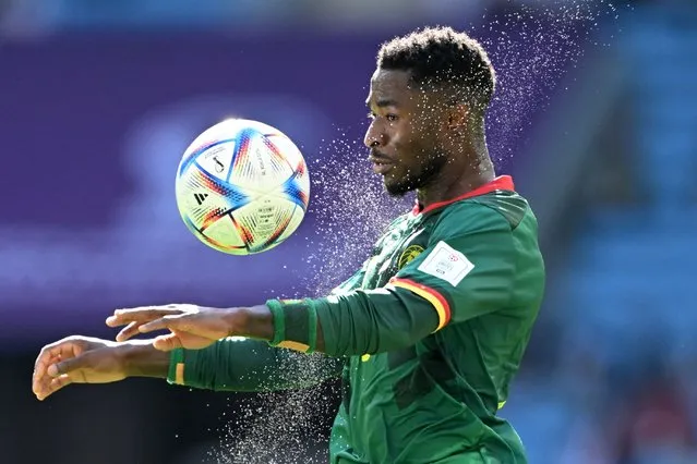 Cameroon's midfielder #18 Martin Hongla controls the ball during the Qatar 2022 World Cup Group G football match between Switzerland and Cameroon at the Al-Janoub Stadium in Al-Wakrah, south of Doha on November 24, 2022. (Photo by Kirill Kudryavtsev/AFP Photo)