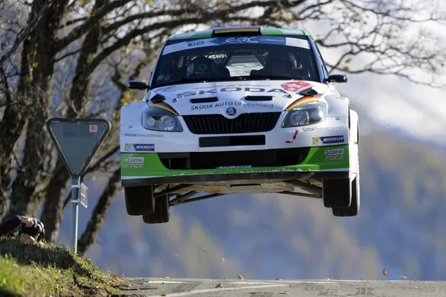 Driver Seep Wiegand of Germany and co-driver Frank Christian of Germany drive their Skoda Fabia S2000 during the 9th stage of the 55th Rallye International du Valais (RIV) a FIA European Rally Championship, in Les Collons, Switzerland, 24 October 2014. (Photo by Maxime Schmid/EPA)