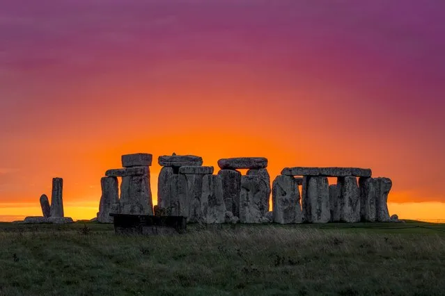 Pictured is the sunset at Stonehenge in Wiltshire on Saturday night, September 24, 2022. (Photo by Nick Bull/pictureexclusive.com)