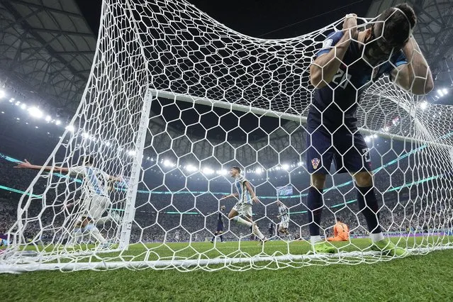 Croatia's Josko Gvardiol reacts after Argentina's Julian Alvarez scored his side's second goal during the World Cup semifinal soccer match between Argentina and Croatia at the Lusail Stadium in Lusail, Qatar, Tuesday, December 13, 2022. (Photo by Martin Meissner/AP Photo)