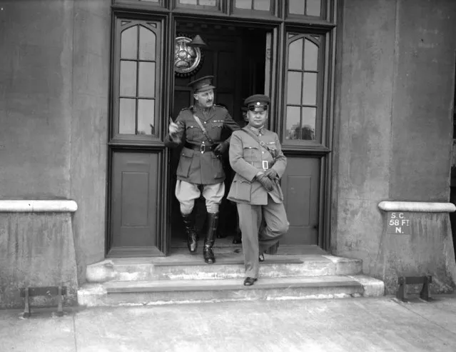 Chinese General Yang Chich leaves the library complex after a tour, during his visit to the Royal Military Academy in London's Woolwich, 1st June 1934. (Photo by PNA Rota/Getty Images)