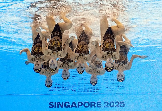 Team China perform during the artistic swimming final at the World Aquatics Championships at World Aquatics Championships Arena on July 22, 2025 in Singapore. (Photo by Marko Djurica/Reuters)