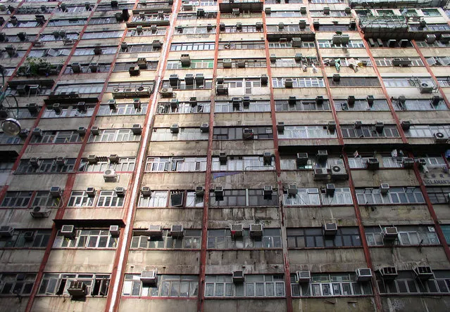 Facade of the infamous Chungking Mansions, Hong Kong's “mmigrant ghetto”. (Photo by Tom Carter/The Atlantic)