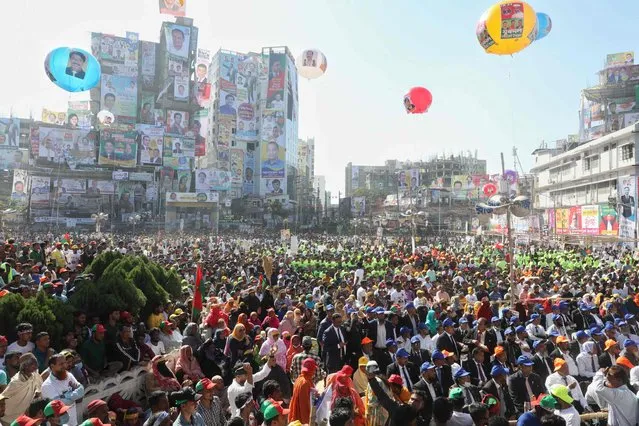 Supporters of Bangladesh Nationalist Party (BNP) gather during a rally in Comilla on November 26, 2022. (Photo by Jibon Ahmed/AFP Photo)
