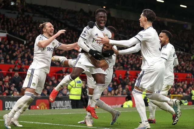 Wilfried Gnonto of Leeds United celebrates with Crysencio Summerville after Raphael Varane of Manchester United concedes an own goal, the second goal for Leeds United, during the Premier League match between Manchester United and Leeds United at Old Trafford on February 08, 2023 in Manchester, England. (Photo by Naomi Baker/Getty Images)