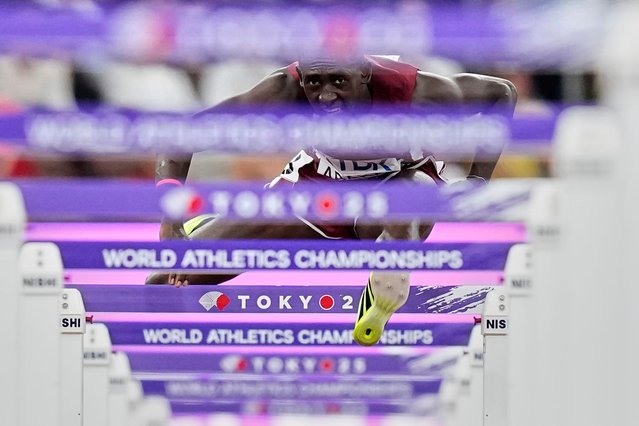Qatar's Oumar Doudai Abakar competes in a men's 110 meters hurdles heat at the World Athletics Championships in Tokyo, Monday, September 15, 2025. (Phoot by Petr David Josek/AP Photo)