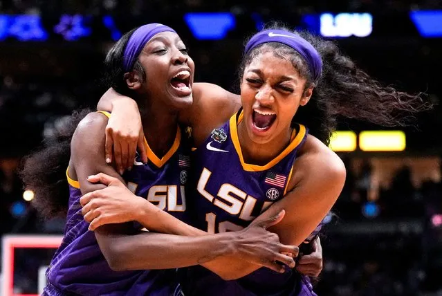 LSU Lady Tigers guard Flau'jae Johnson, left, celebrates with forward Angel Reese after defeating the Virginia Tech Hokies in semifinals of the women's Final Four of the 2023 NCAA Tournament at American Airlines Center in Dallas, TX on March 31, 2023. (Photo by Kirby Lee/USA TODAY Sports)