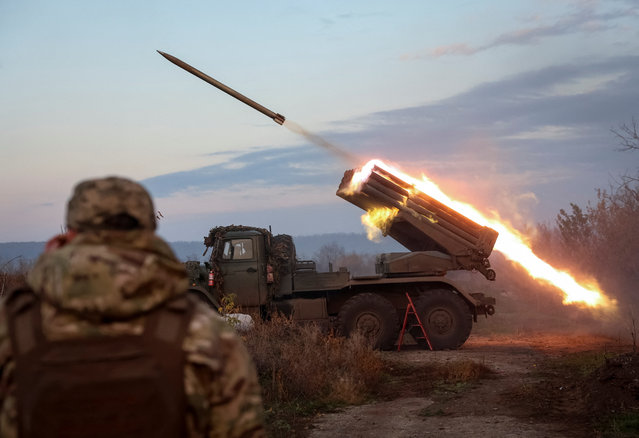Servicemen of the 148th Artillery Brigade “Zhytomyr” of the Ukrainian Armed Forces fire a BM-21 Grad multiple rocket launch system towards Russian troops, amid Russia's attack on Ukraine, near the frontline town of Kostiantynivka in Donetsk region, Ukraine on October 23, 2025. (Photo by Anatolii Stepanov/Reuters)