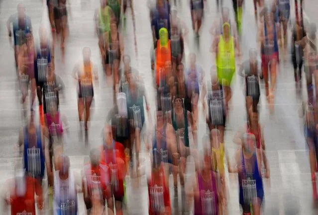 A general view of participants in action during the 127th Boston Marathon in  Boston, Massachusetts, U.S. on April 17, 2023. (Photo by Sophie Park/Reuters)