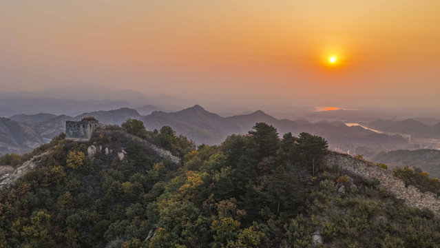 An aerial drone photo taken on October 28, 2025 shows the scenery in the morning at a section of the ancient Great Wall in Zunhua City of north China's Hebei Province. (Photo by Xinhua News Agency/Rex Features/Shutterstock)