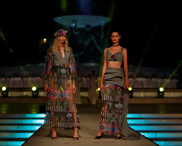 Models present creations by designer Ritienne Zammit during the Malta Fashion Awards, the climax of Malta Fashion Week, in front of the Triton fountain in Valletta, Malta on June 2, 2018. (Photo by Darrin Zammit Lupi/Reuters)