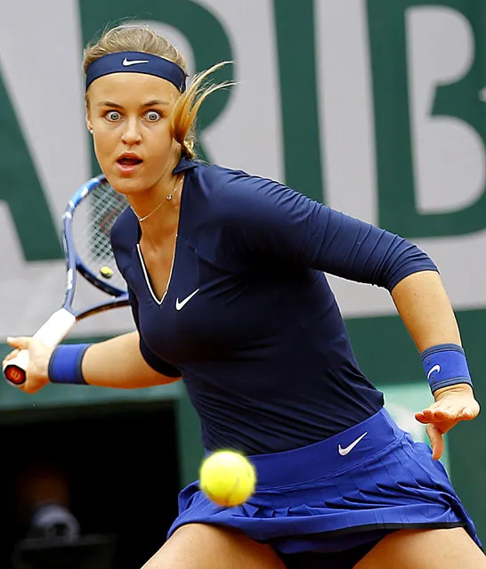 Anna Karolina Schmiedlova of Slovakia in action against Garbine Muguruza of Spain during their women's single first round match at the French Open tennis tournament at Roland Garros in Paris, France, 23 May 2016. (Photo by Robert Ghement/EPA/EFE)